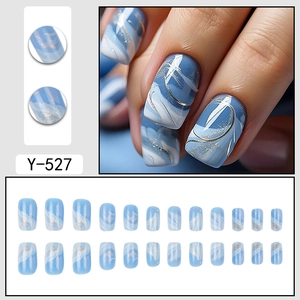 Short square press-on nails with blue and white gradient, gold lines and silver glitter