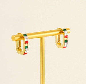 Detailed close-up of 18K gold U-shaped earrings with colorful rectangular zircon stones