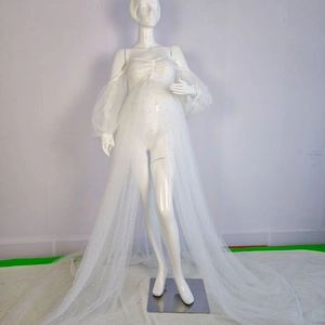White off-shoulder maternity tulle gown with pearls, puff sleeves, and a long trail