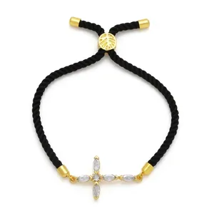 Minimalistisches schwarzes Kreuz-Armband mit funkelnden Zirkonia und goldenem Schiebeverschluss