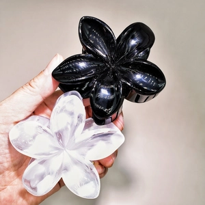 Floral plumeria hair claws in gloss black and frosted translucent white resin