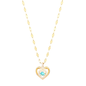 Golden heart necklace with angel wings, light blue center stone and crystal accents