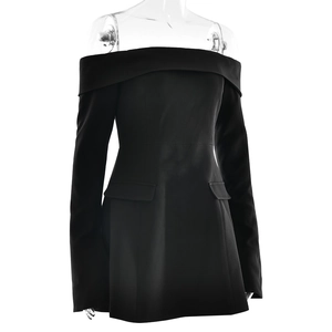 Detail of a black off-shoulder long sleeve mini dress with functional flap pockets