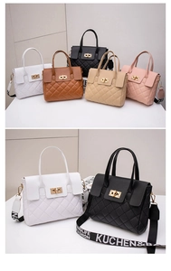 Close-up of quilted leather handbags with golden turn-lock and patterned wide strap