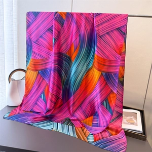 Silk-textured scarf with vibrant abstract stripes in magenta, purple, and blue tones