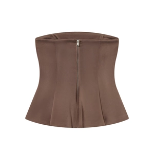 Detail of brown corset tube top with central metal zipper on high-quality satin fabric