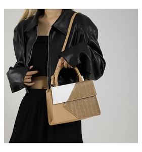 Sac à main chic bicolore kaki à motif crocodile et cuir lisse blanc cassé