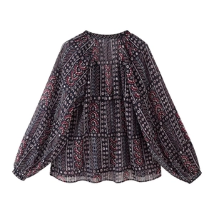 Women's paisley print long sleeve blouse with bohemian style and loose fit silhouette