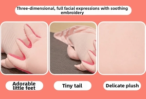 Detail of pink axolotl plush toy showing soft fabric texture and embroidered little feet