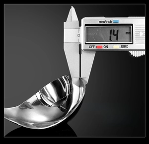 Close-up of 1.4mm thickened stainless steel oil separator spoon edge showing durability