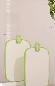 Detail of antimicrobial fruit cutting board with silver ions and hanging hole