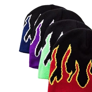 Knitted beanie with flame patterns in blue, purple, green and red colors