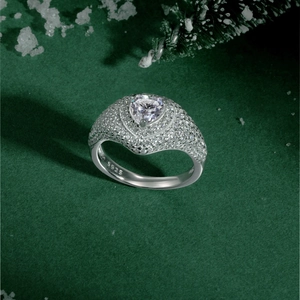 Macro detail of S925 sterling silver heart ring with zircon stones in Christmas theme
