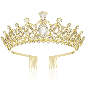 Macro shot of crystal bridal tiara showing golden alloy texture and teardrop stones