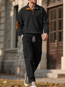 Detail of men's corduroy two-piece set with brown collar patches and sleeve details