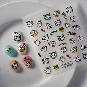 Detailed 5D embossed nail art stickers featuring cute cartoon cats and relief texture