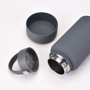 Detailed view of 650ml stainless steel bottle parts with silicone base and matte finish