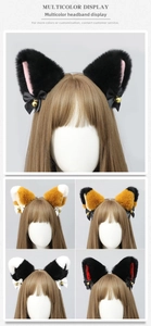Close-up of plush cat ears headband with silk ribbons and golden bells in various colors