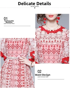Detail der roten Blumenstickerei am Kleid mit Spitzenausschnitt und Perlengürtel