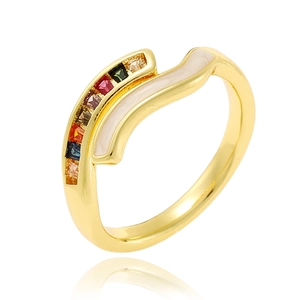 Detailed macro view of wavy golden ring with colorful gemstones and white inlay texture