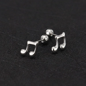 Detailed view of silver musical note stud earrings with secure screw ball backing