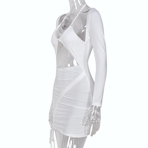 Detail of white long sleeve cutout mini dress with side ruching and neck ties