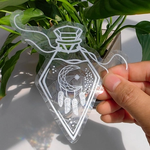 Rainbow suncatcher window cling with diamond bottle and moon stars design