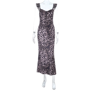 Close-up of leopard print fabric with ruffle shoulder straps and drawstring V-neck detail