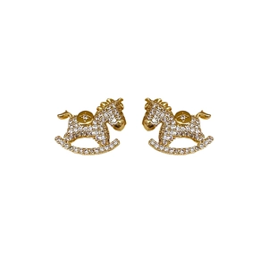 Sparkling silver needle earrings with horse design and clear crystals on white background