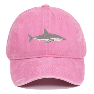 Detailed view of shark embroidery on pink washed cotton vintage baseball cap