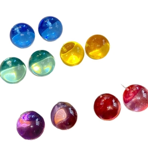 Colorful round resin stud earrings in vibrant blue green yellow and purple hues