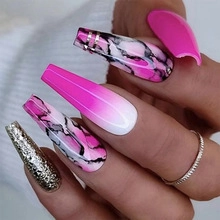 Detailed view of long coffin nails with marble patterns, pink gradients and golden sequins