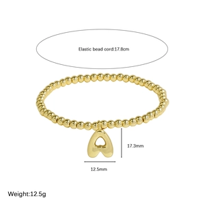 18k gold plated brass elastic bead bracelet with heart pendant and 17.8cm cord length
