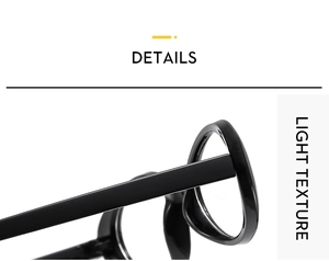 Detail of glossy black vintage eyeglass frame showcasing sleek minimalist hinge design