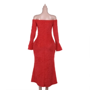 Detail of red off-shoulder knit dress with faux fur texture and flared cuffs back view