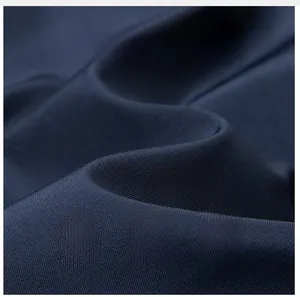 Macro-detail van donkerblauwe geweven stof met fijne scheurbestendige rastertextuur