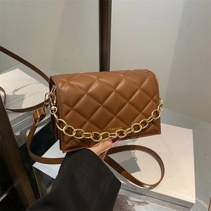 Brown quilted chain shoulder bag with gold hardware and stylish flap closure design