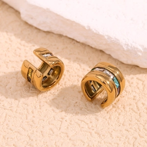 Detail of 18K gold plated C-shaped ear cuff with multi-color zircon stones inlay