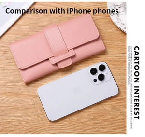 Pink long wallet for women shown next to an iPhone to demonstrate product size and scale