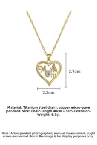 Detail of gold Mom heart pendant with butterfly and zircons on a titanium steel chain