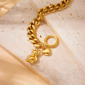 Gold-plated stainless steel thick chain bracelet with bear and heart charms on stone base
