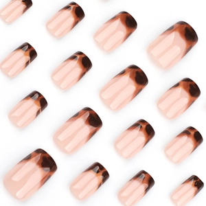 Short square press on nails with French tortoiseshell design in brown and nude tones