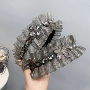 Grey pleated fabric headbands with rhinestone flower and butterfly embellishments