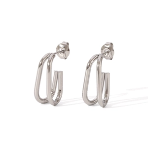 Detailed view of silver geometric U-shaped double-line stainless steel earrings on white