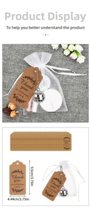 Detail of kraft thank you gift tags with size 9.5cm x 4.44cm and white organza bags
