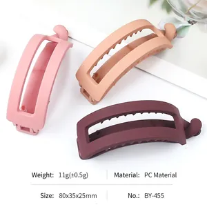 Matte PC banana hair clips for ponytail styling in pink, apricot, and dark coffee colors