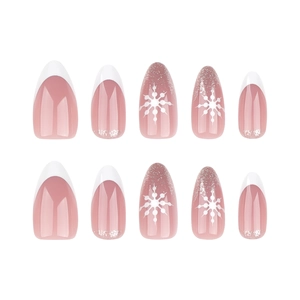 Short almond press-on nails with white French tips, snowflakes, and silver glitter for Christmas