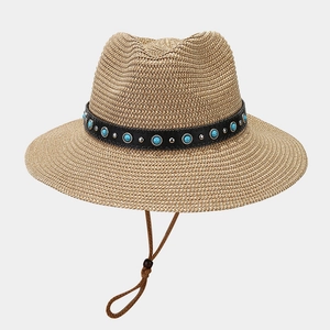 Classic straw cowboy hat with turquoise beads and black leather decorative band