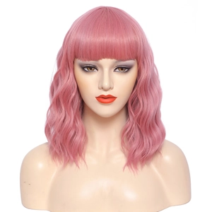Close-up showing the soft pink water wave texture and bangs of the short bob wig