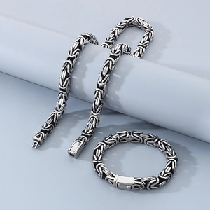 Detail of silver Byzantine chain bracelet and necklace set with a vintage finish